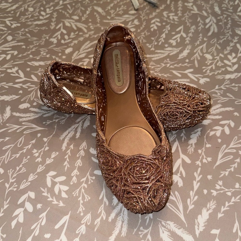 Melissa and campana women’s pink gold flats NEVER WORN.  Size 9.